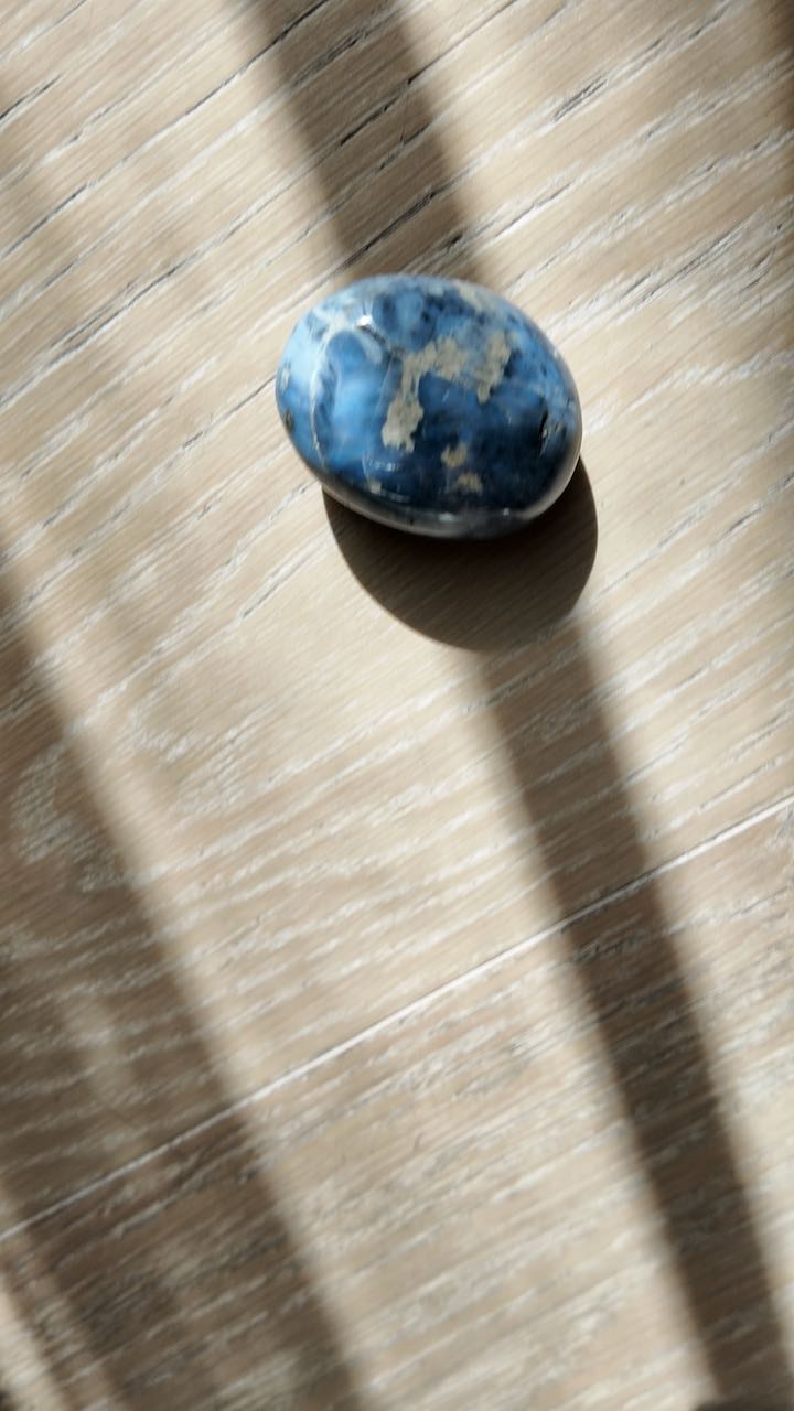Blue quartz from Madagascar, soft blue with white clouding, seen from above