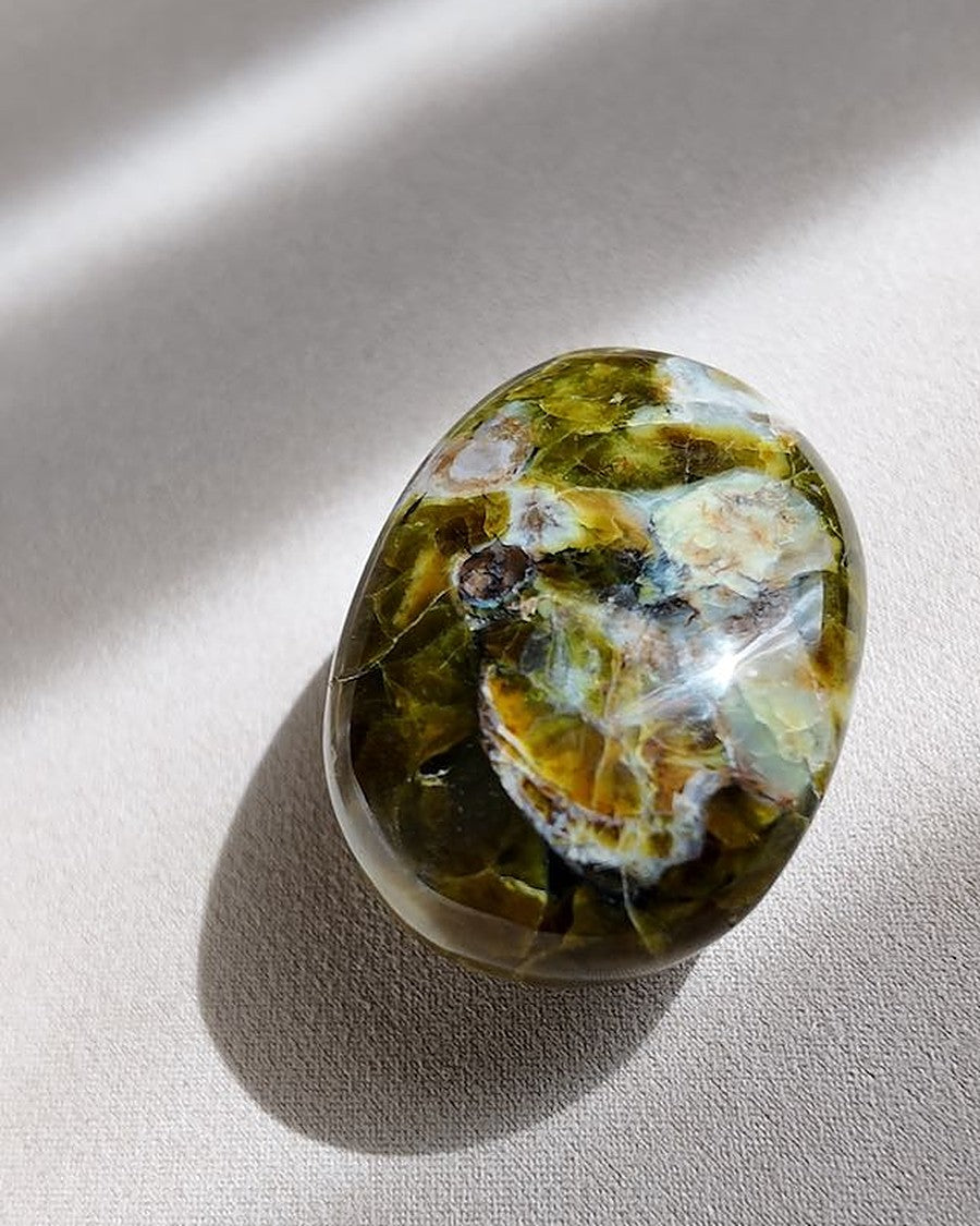 OPEN green opal palm stone on cream tray