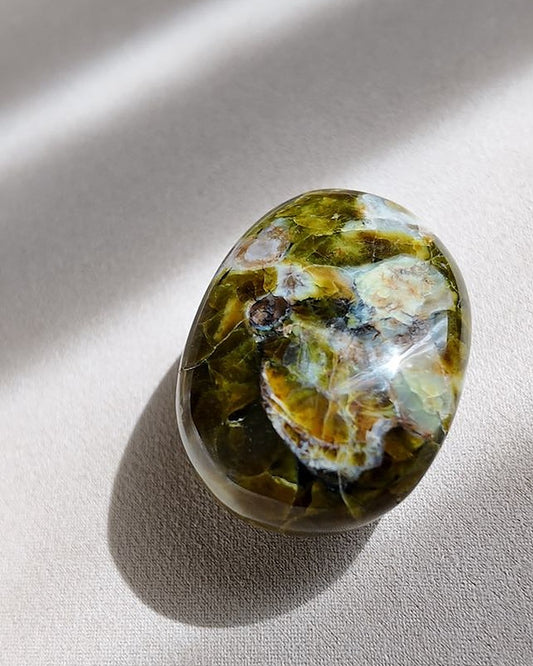 OPEN green opal palm stone on cream tray