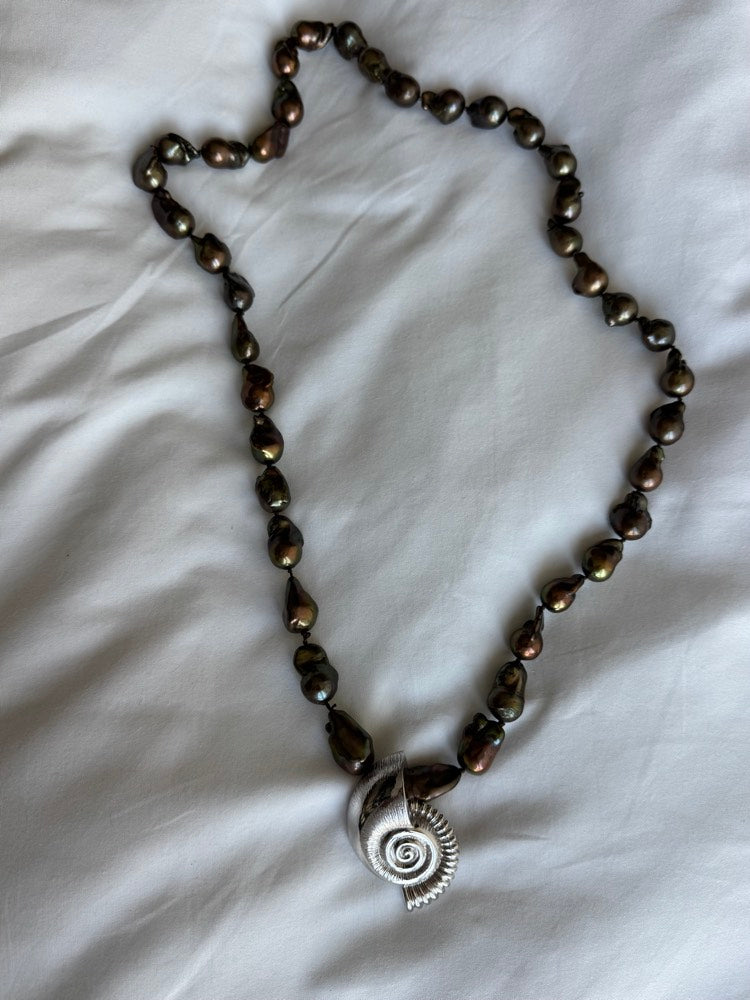 NIGHT SWIM necklace, chocolate baroque pearls with a spiral shell pendant