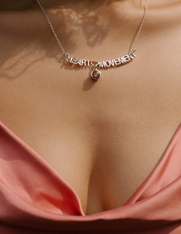 Adore Adorn Necklace Heart Movement Necklace in Silver